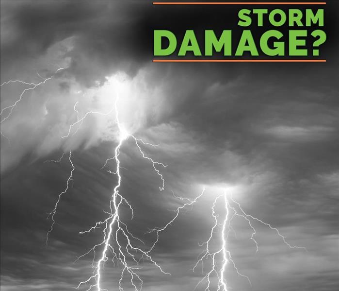 Picture of a stormy nigh sky with lightning striking and text "storm damage?"